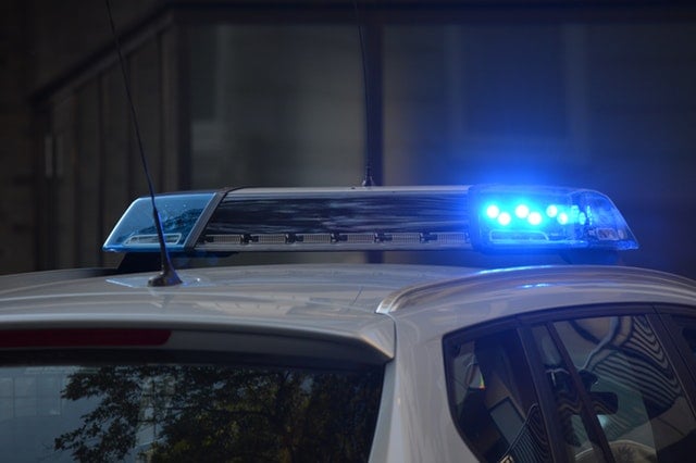police car with blue lights on top are multiple duis a felony